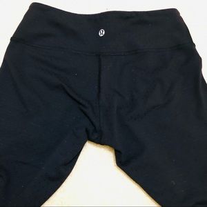 Lululemon crop leggings (w/ black polka dots) size 6 black